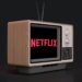 A guide to cancel Netflix account, showing Netflix logo in a classic television set