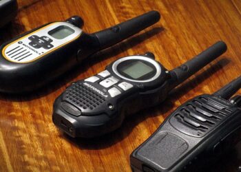 Walkie-Talkies placed on a wooden table