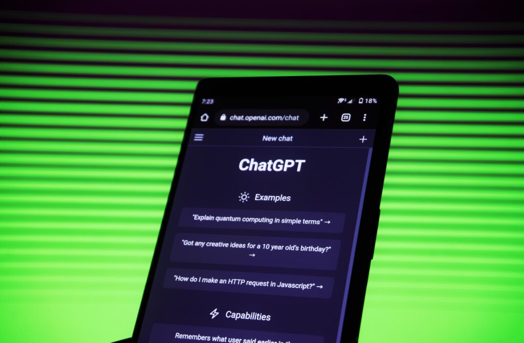 A photo of a phone with ChatGPT chat opened in browser