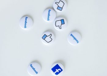 A photo of Facebook logo and badges