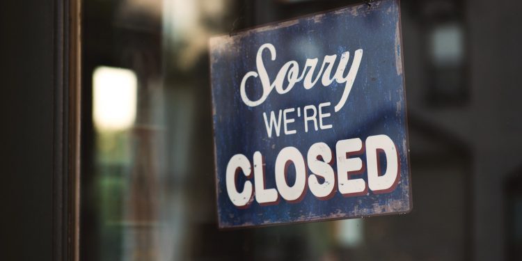 A photo of a small business closed door due to coronavirus outbreak