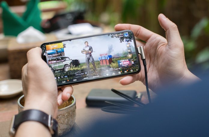 download-PUBG-game-smartphone A person playing PUBG after downloading from the Play Store