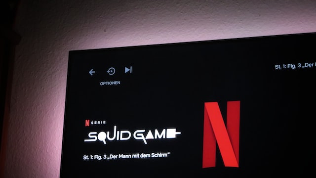 Squid Game running on Netflix on a TV